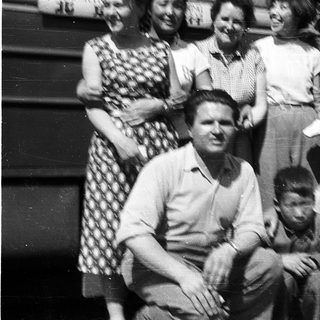 Family group portrait from mid-20th century.