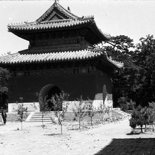 Traditional East Asian pavilion with curved tiled roofs.