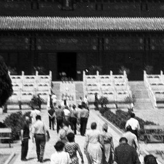 Traditional East Asian palace complex with classic tiled roofs.