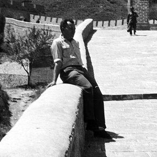 Man posing on Great Wall battlements.