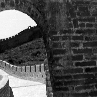 Architectural brick arch with measuring scale overlay.