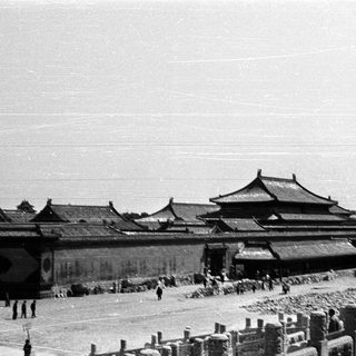 Historic Forbidden City courtyard with traditional Chinese architecture.