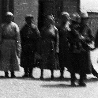 Group of people in early 20th-century military uniforms.
