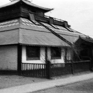 Traditional Asian-style building with tiled roof.