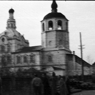 Historic Russian Orthodox church with bell tower.