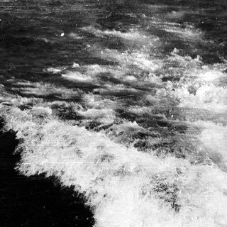 Stormy ocean waves crashing violently.