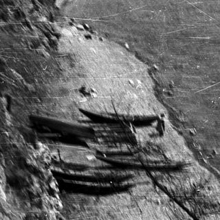 Ancient rock-cut steps carved into cliffside.