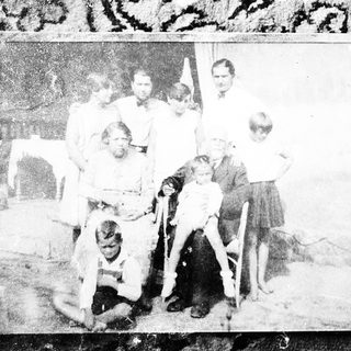 Family group portrait from mid-20th century.