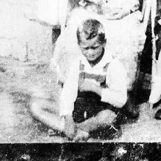 Family group portrait from mid-20th century.