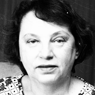 Black-and-white portrait of an older woman.