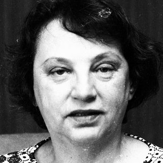 Black-and-white portrait of an older woman.