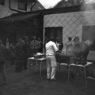 People gathered indoors during a gathering or event.