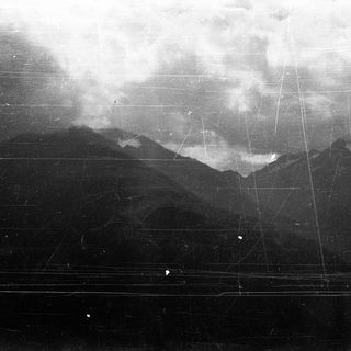 Historic aerial view of volcanic eruption.