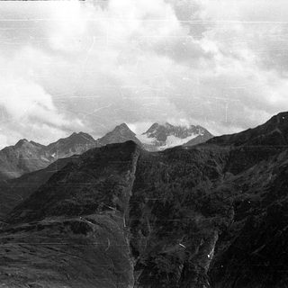 Majestic mountain peaks with snow-capped ridges.
