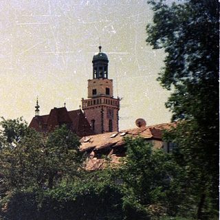 Historic European town with castle tower.