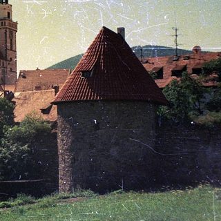 Historic town with castle and medieval architecture.