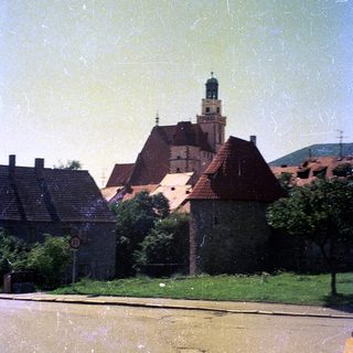 Historic building with church tower in town.