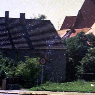 Historic building with church tower in town.