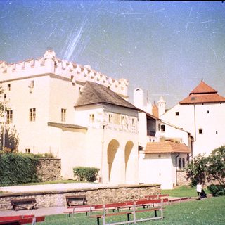 Medieval-style castle with crenellated walls and towers.