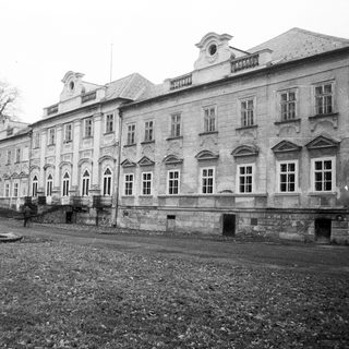 Historic stone building with classical architectural features.