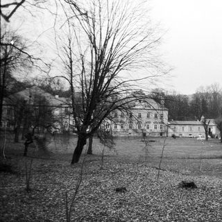 Rural estate with large house and open grounds.