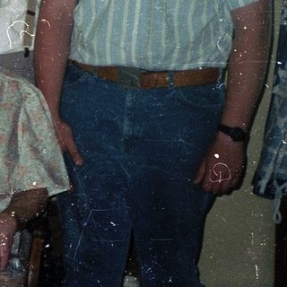 Family group portrait from the 1980s or 1990s.