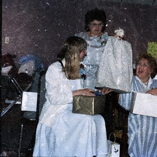 Birthday celebration with gift exchange.