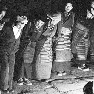 Traditional nighttime folk gathering with communal singing.