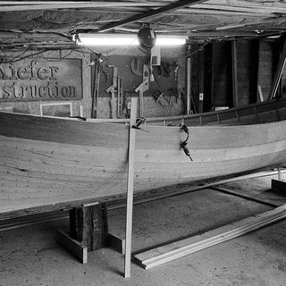 Boat under construction at Kiefer Construction workshop.