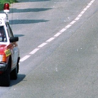 Cyclists participating in a road race event.