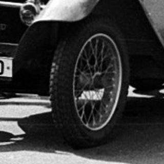 Vintage cars in a vintage parade.