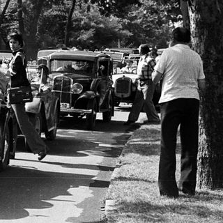 Vintage cars in a vintage parade.