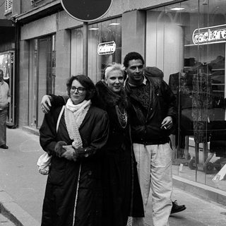 People walking on Paris street in winter.