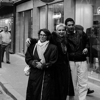 People walking on Paris street in winter.