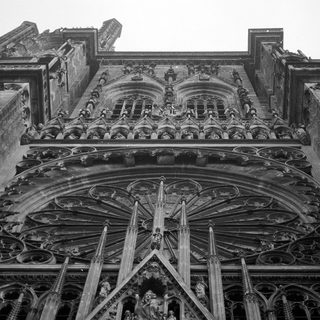 Gothic cathedral façade with intricate stone carvings.