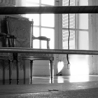 Vintage gymnasium with balance beam and vintage furniture.