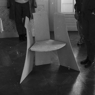 Unconventional seating sculpture in indoor gallery space.
