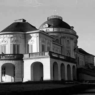 Elegant neoclassical palace by waterfront.