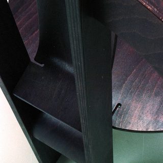 Modern geometric wooden chair legs.