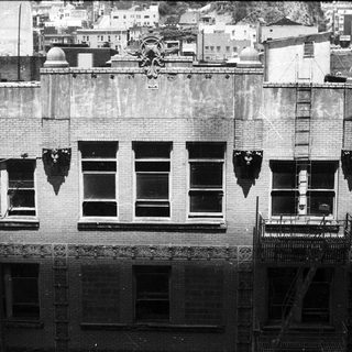 Vintage urban building under renovation or demolition.