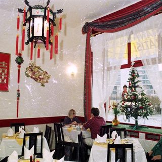 Chinese restaurant interior during winter with festive decorations.