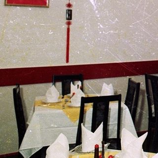 Chinese restaurant interior during winter with festive decorations.