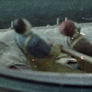 Miniature Viking longship model with crew.