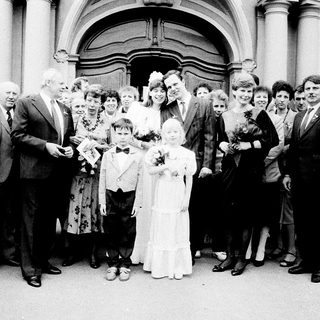 Wedding ceremony group photo outside church.