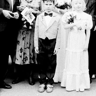Wedding ceremony group photo outside church.