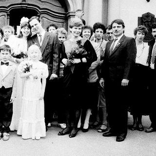 Wedding ceremony group photo outside church.