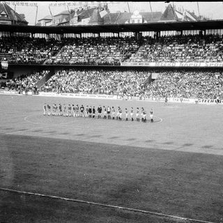 National team pre-match warm-up at stadium.
