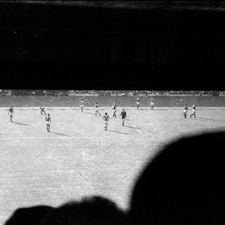 Black-and-white soccer match in progress.