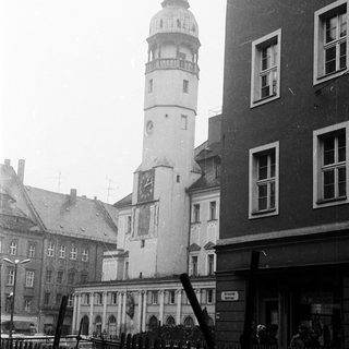 Historic European town with clock tower.