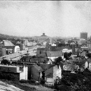 Historic cityscape with early 20th-century architecture.